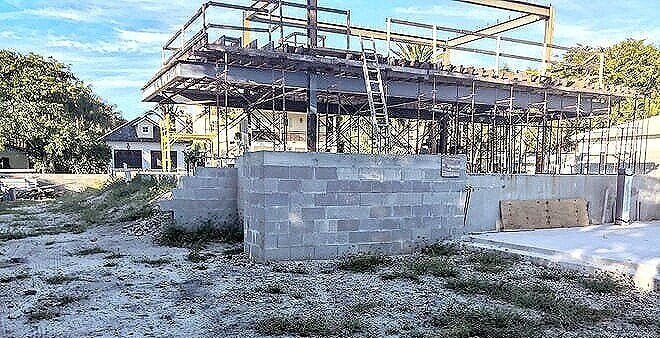 This site photo shows that, as of the moment it was taken, some of the Biggs Residence’s structural steel was still in place—but most of the rest of the house (exterior and interior walls, windows, ceilings, finishes, cabinetry, fittings…) has been …
