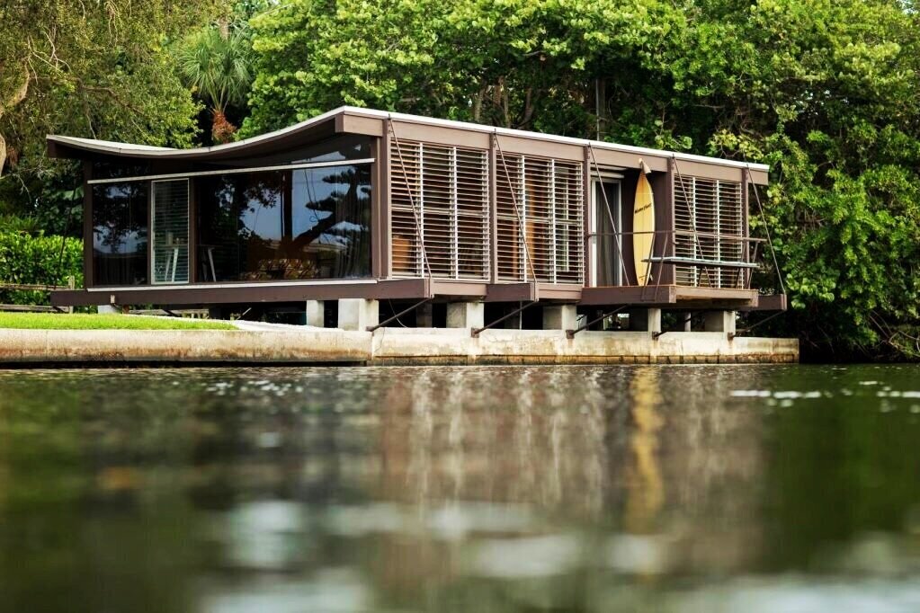The guest house, a Florida vacation structure built for the Healy family, sits along the water in Sarasota.
