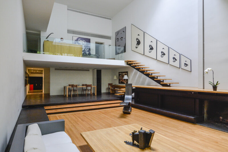 The living room floor and stair treads are now wood. According to the plans, they will remain wood. Photo by Carl Bellavia, Archives of the Paul Rudolph Heritage Foundation.
